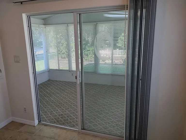 Florida Room. Over 200 sq feet of air conditioned space. Backs up to nature area.
