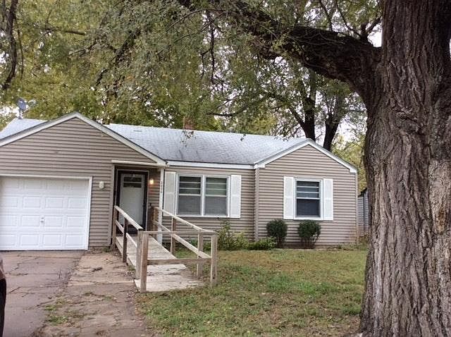 Front of house showing ramp