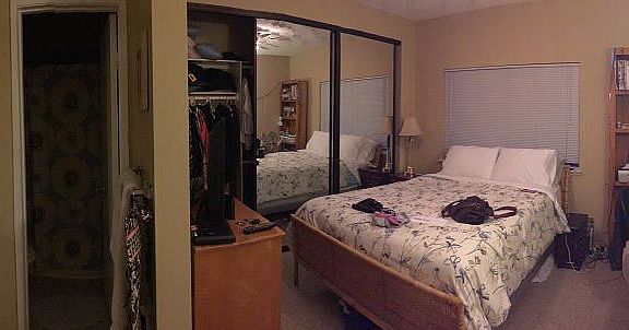 Bedroom with Mirror Closets
