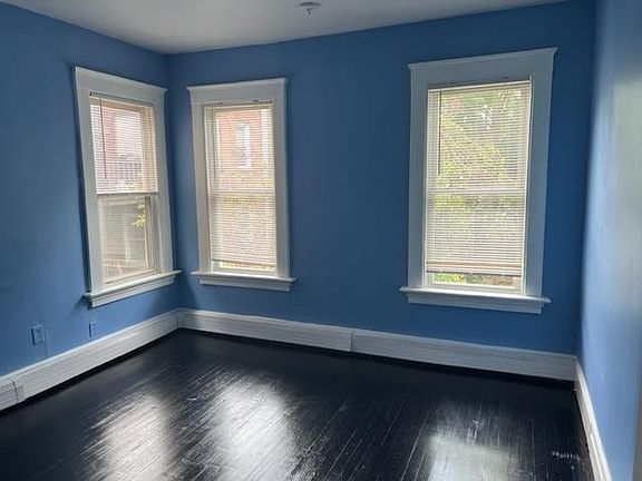 back bedroom, newly varnished floors and painted walls