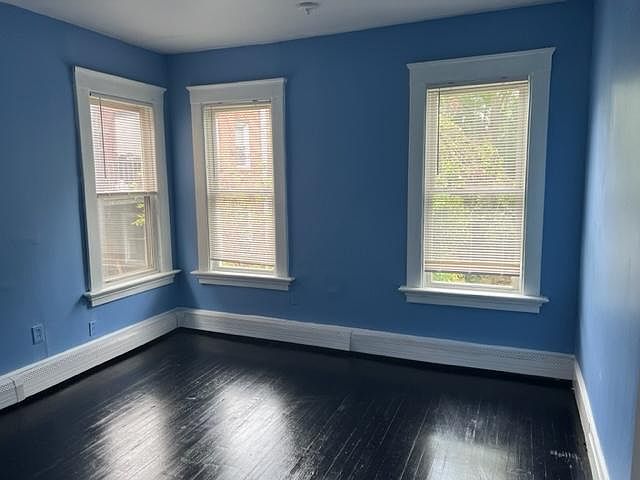 back bedroom, newly varnished floors and painted walls