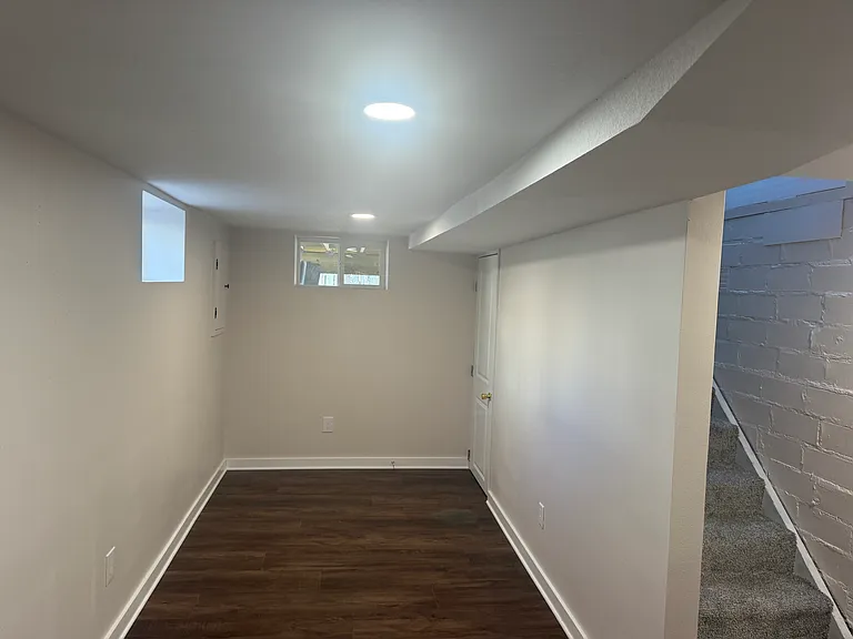 one of two living spaces on lower level