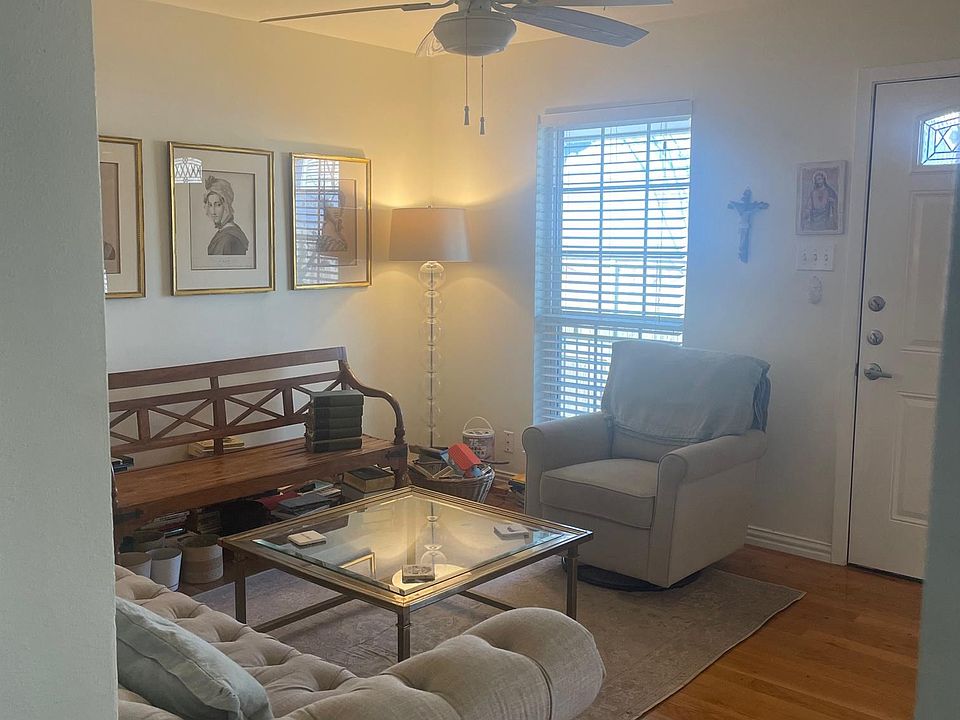 Living room is well defined, yet open to the dining room and kitchen.