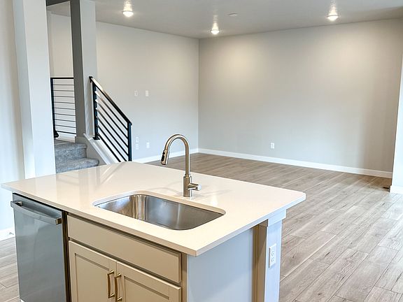 Kitchen and living room.