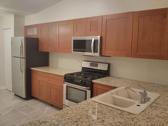 New Kitchen with Stainless appliances and Granite countertop