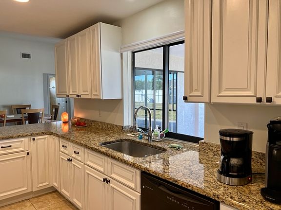 Kitchen with pass through window