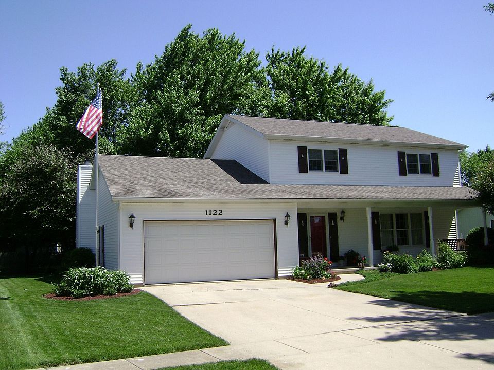 Front view with covered porch