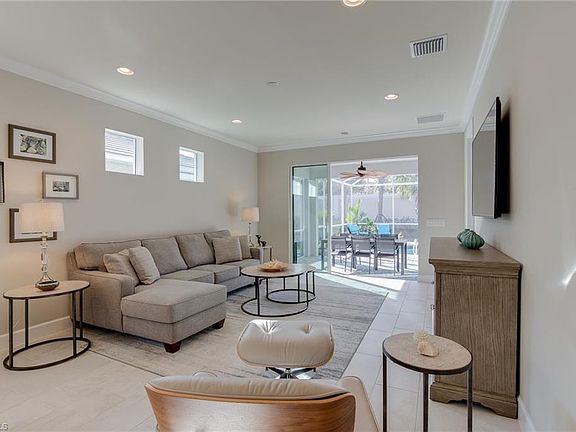 Living room. Leather chair in foreground not included.