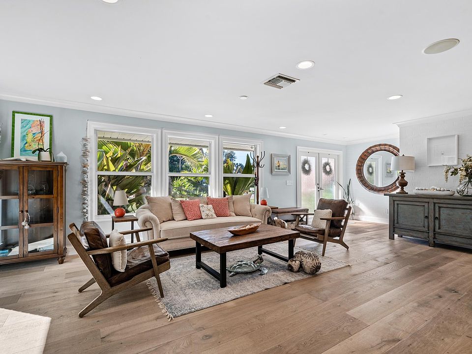 All new custom impact windows and doors. Real French Oak floors. Very bright natural light throughout