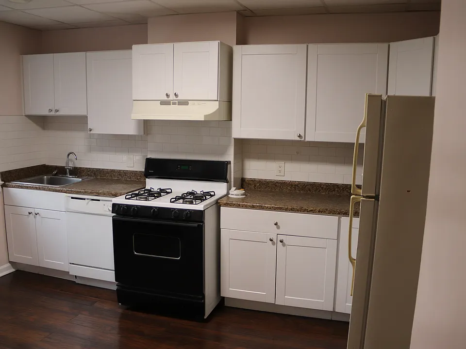 Clean spacious kitchen with plenty or room and modern appliance will be installed for new renters.