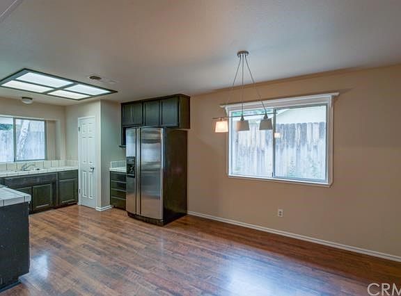 Open kitchen with pantry.