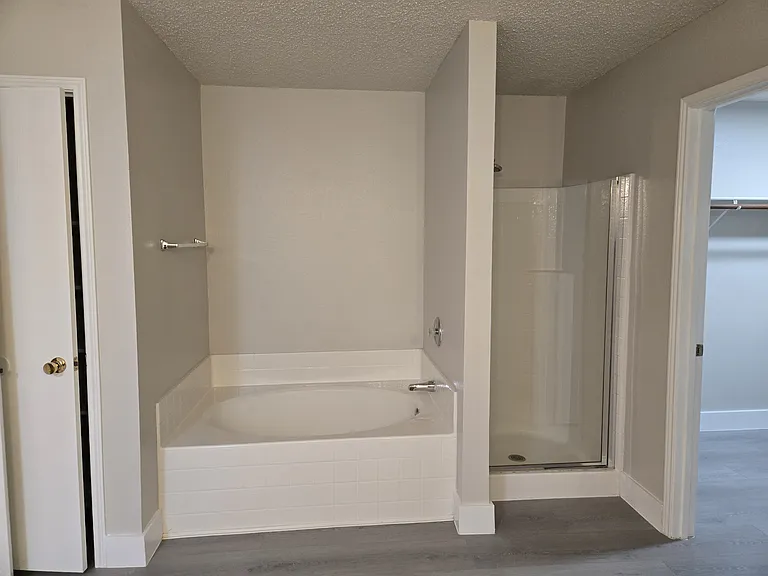 Master bedroom suite:
- large bedroom with large windows
- master bathroom with tub & shower
- his walk in closet
- her walk in closet
- newly painted
- new deluxe flooring
- new fan and lighting fixtures
- new deluxe toilet