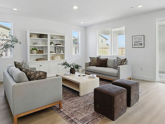Living Room at Plan 5002, The Residences at Arbor Ranch
