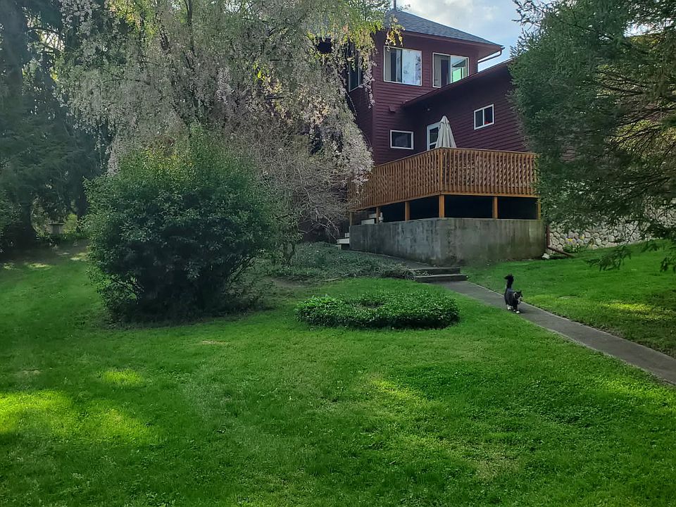 Meandering garden paths that lead to hidden wonders, where ivy dances and the wind hums a lullaby.