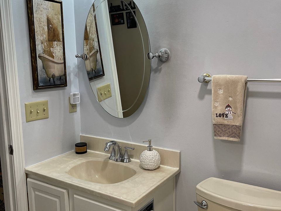 Full bath with standard fiberglass shower/tub unit to the right