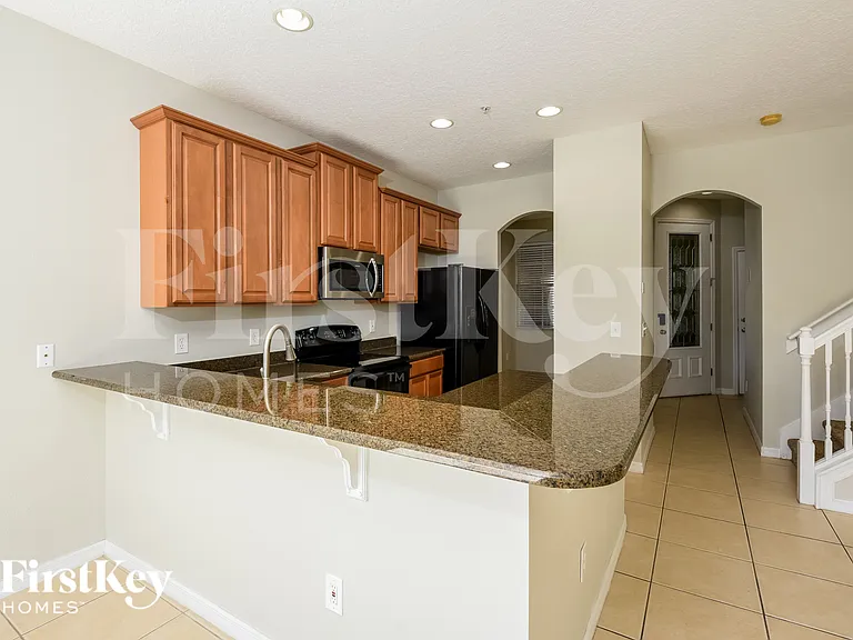 9576 Silver Buttonwood St — Photo 6