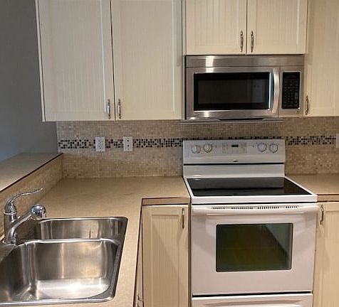 4th image of 9511 102nd Ave #47