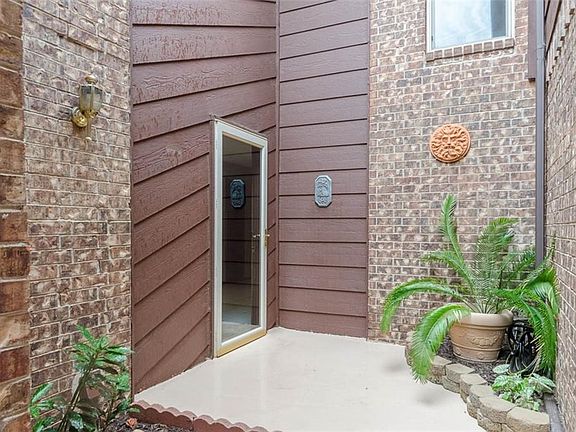 Protected entry with low maintenance beds.