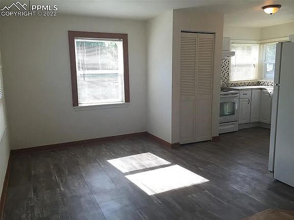 Large, open dining area leading into kitchen