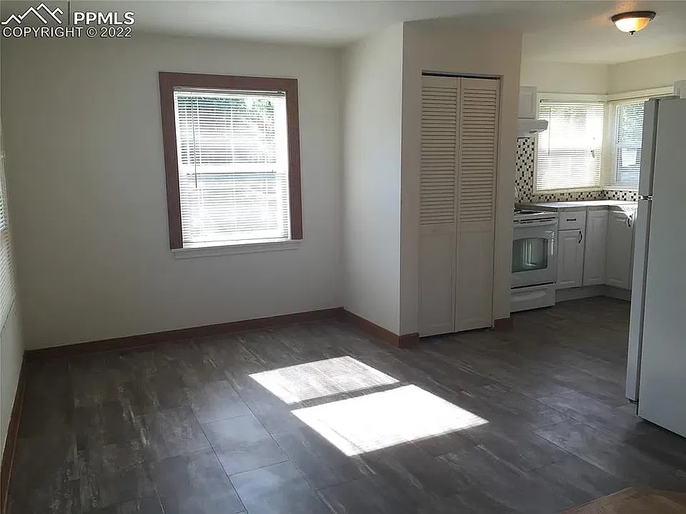 Large, open dining area leading into kitchen