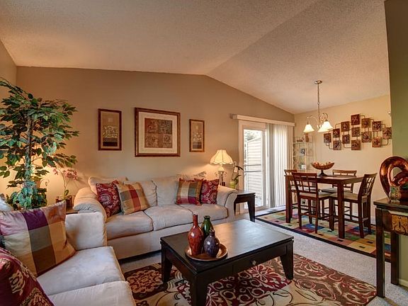 Spacious Living Room with Vaulted Ceilings. Opens up to the informal Dining area.