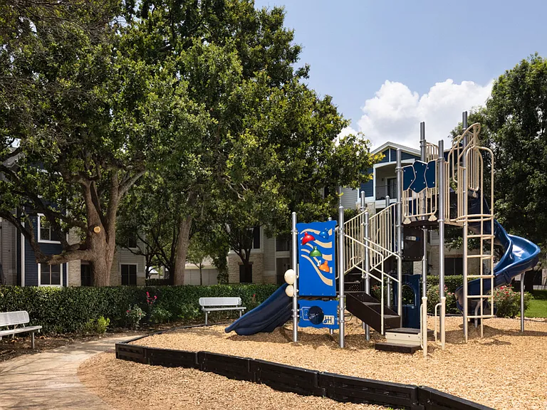Children's playground with bench seating