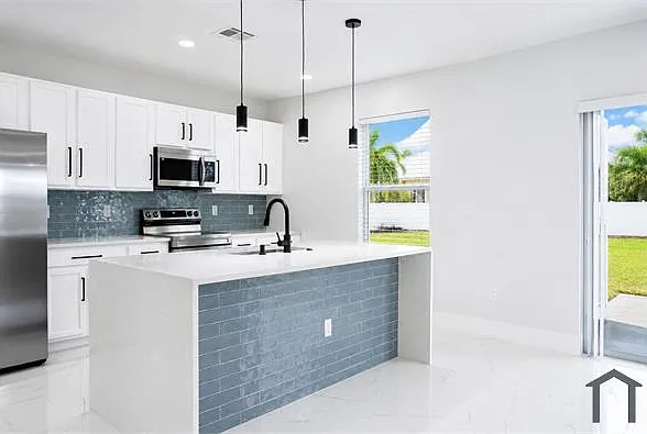 509 SW 27th Ter — Photo 22
