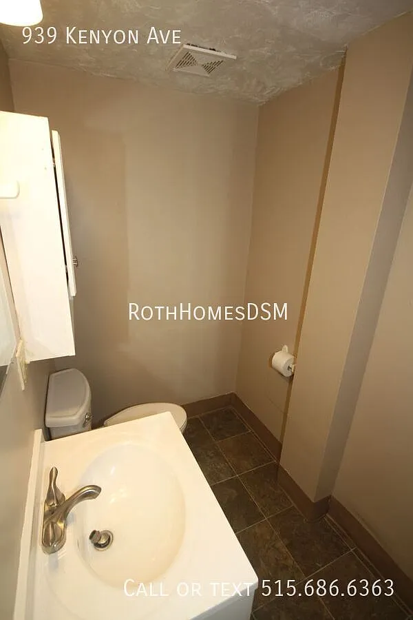 Large 2 Bedroom Duplex with Possible 3rd Bedroom 2nd Bath in Walk Out Basement — Photo 3