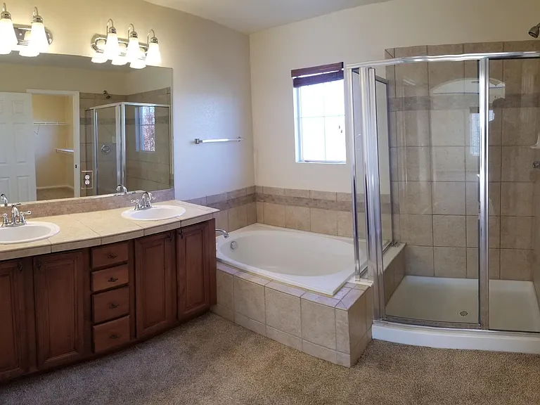 5 piece primary bathroom with dual sinks