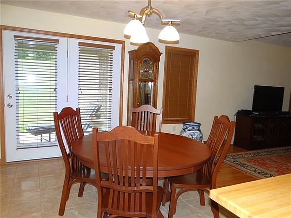 The extra large doors to the patio provide a lot of light and easy access from the kitchen tocarry things out for the grill