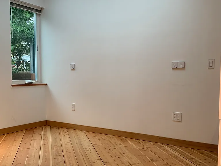 Plenty of space for a queen bed and night stands. Skylights provide lots of natural light.