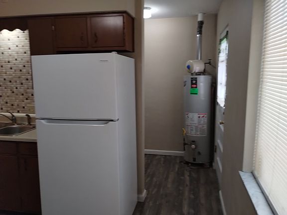 VIEW FROM KITCHEN TO THE UTILITY ROOM