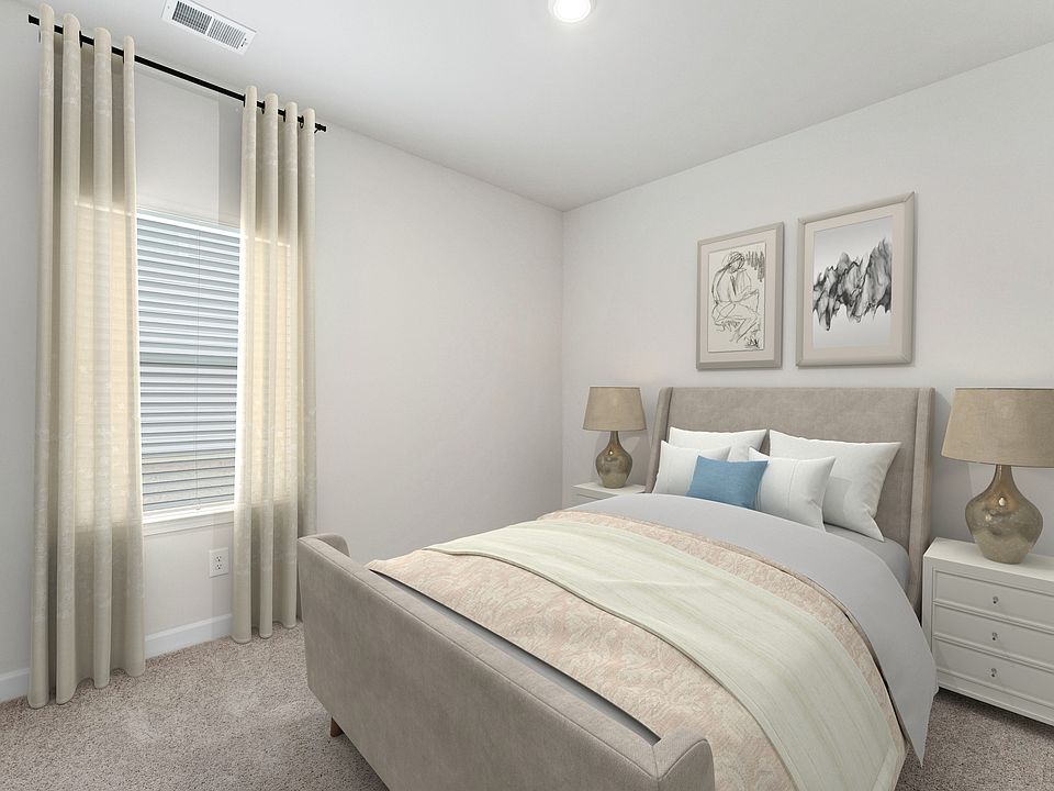 A second bedroom provides guests a spot to rest and relax.
