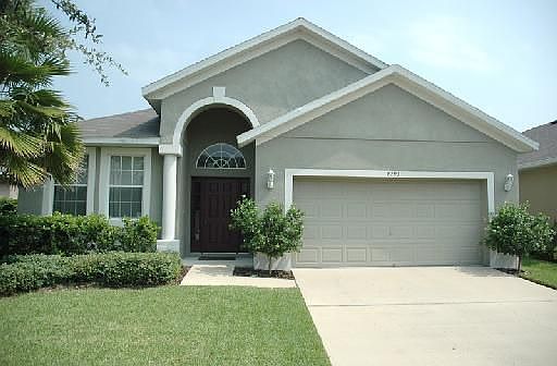 Exterior pict. of 8293 Baywood Vista Drive Orlando, FL  32810 in gated comm.