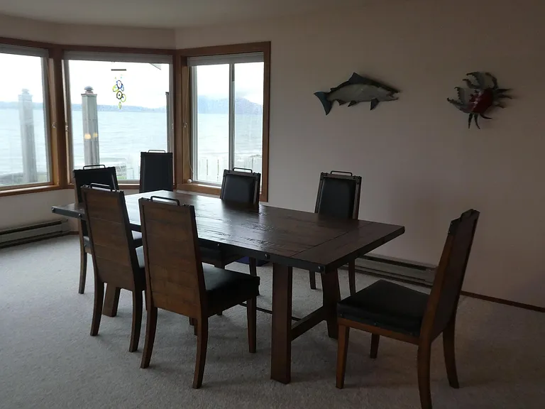 Enjoy the view out the bay window while dining.