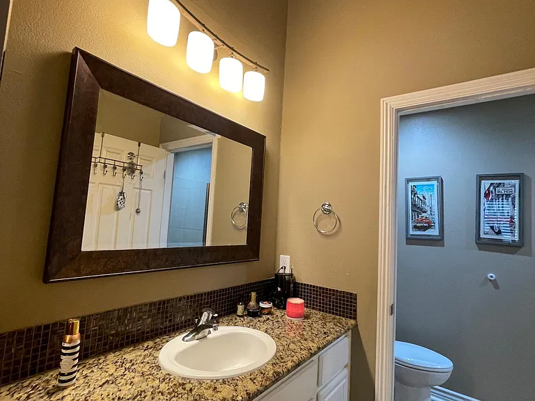 Vanity area that leads to the Master-bedroom bathroom.