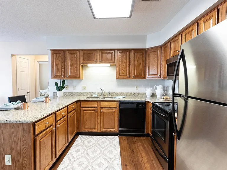 Beautiful Cabinetry in Kitchen Featuring Stainless Steel Appliances