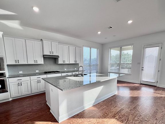 Open kitchen with granite counters