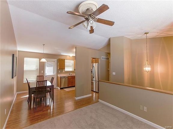 Open and Spacious living room into the dining area, Freshly painted, new carpet (1/17), vaulted ceiling