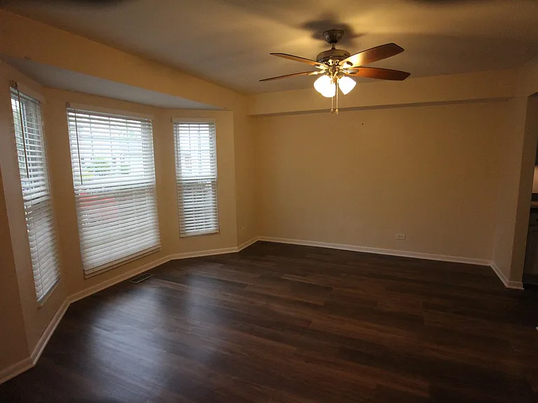 Dining room with bay window.