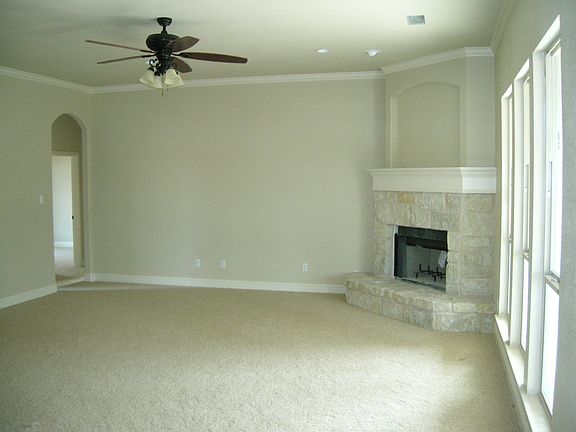 huge living area with corner fireplace