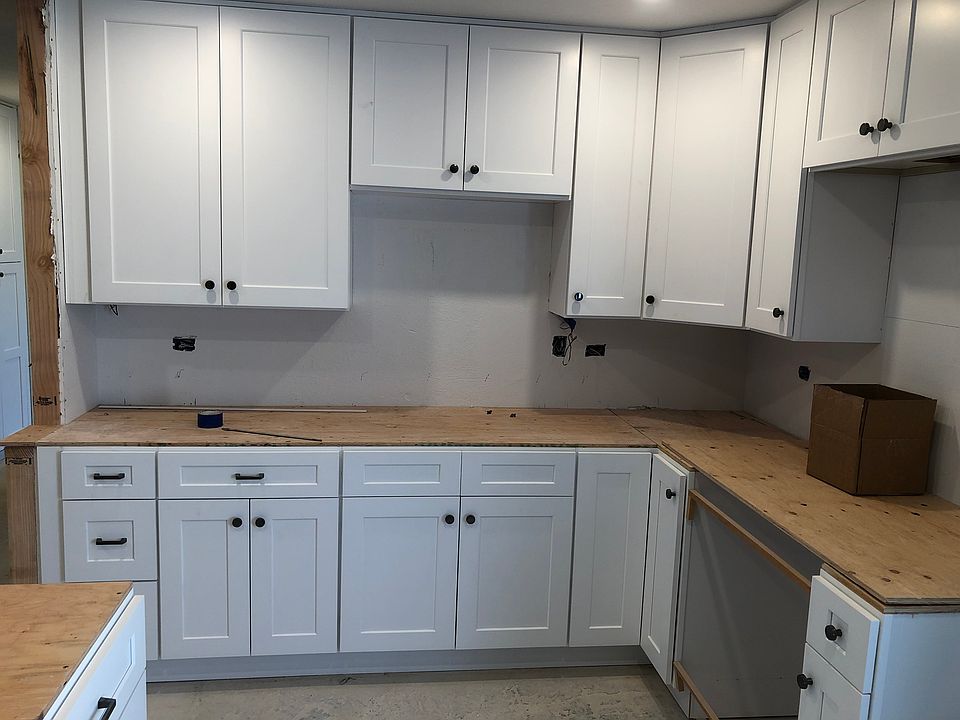 YOUR NEW kitchen in process. New cabinets. Next: new custom quartz countertops, new microwave, new faucets, new under-cabinet lighting, new flooring, new paint. And a new island.