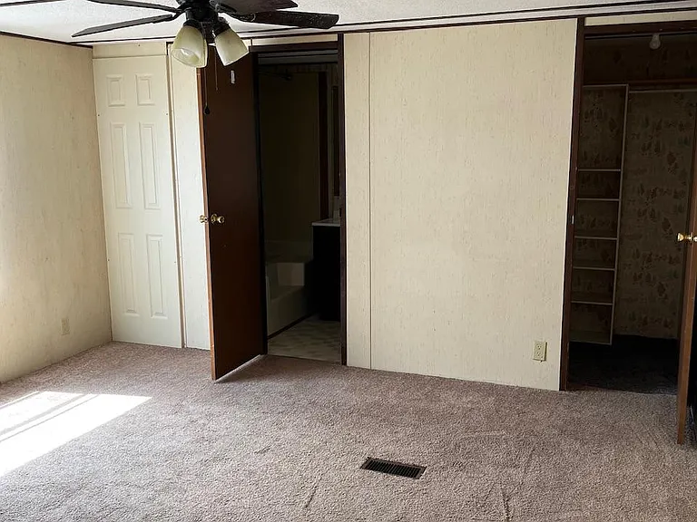 Primary bedroom with walk in closet and full bath.