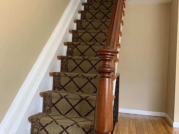 Stairs on the second floor to the third floor.