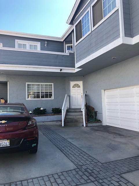Front of this back unit. There are 2 townhouses on his lot. As you can see there is parking in the driveway for 2 cars or in the garage