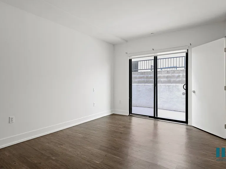 Bedroom with Sliding Glass Door for Balcony Access