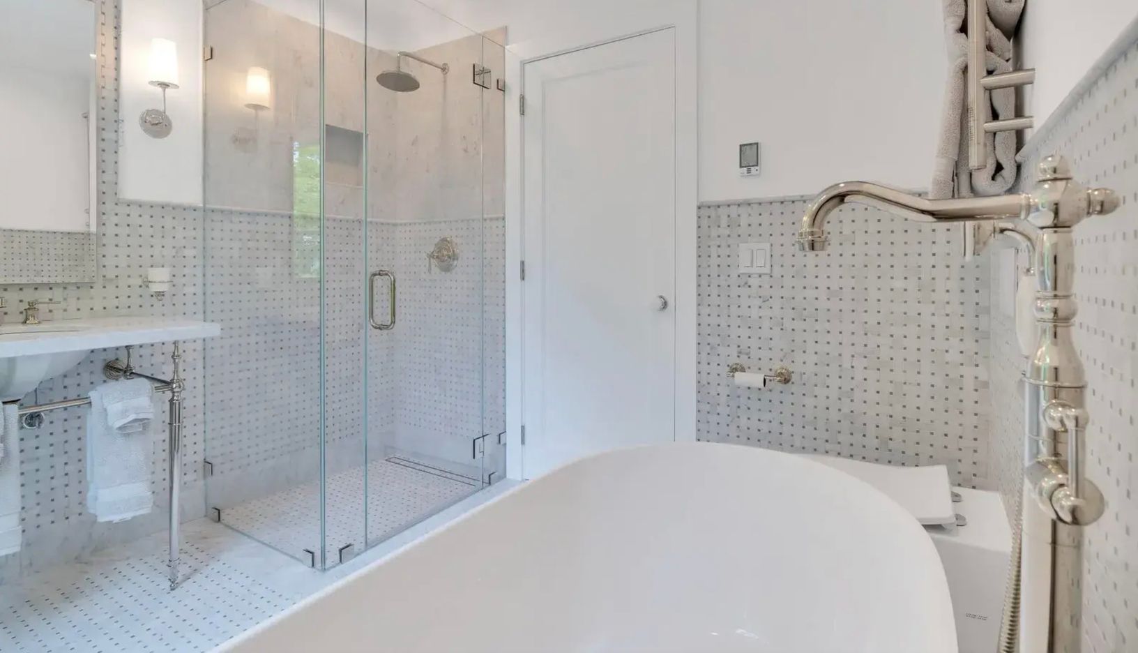  shared bathroom with standing tub and shower