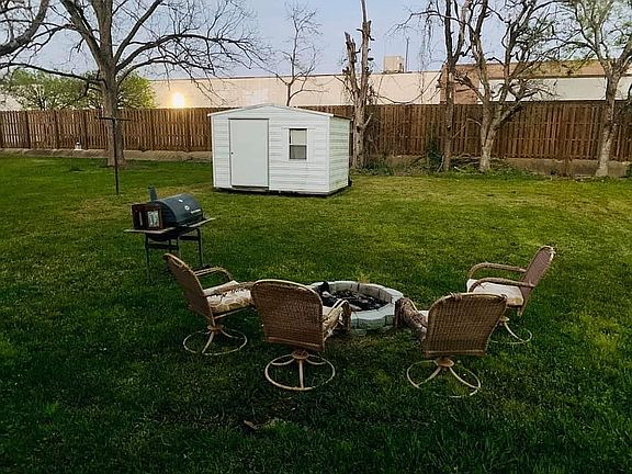 Back yard with storage shed
