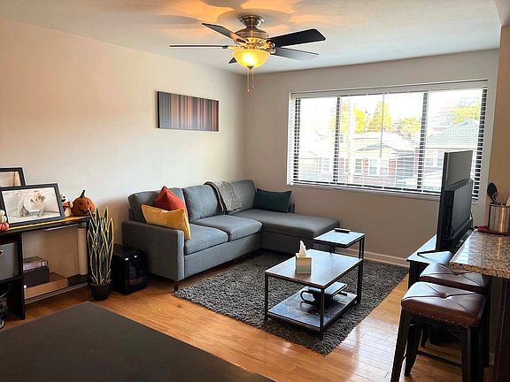 Living Room w/ large window providing natural lighting