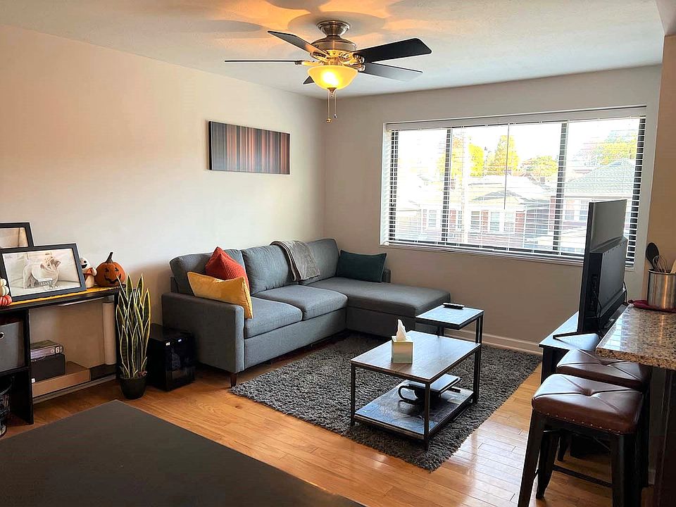 Living Room w/ large window providing natural lighting